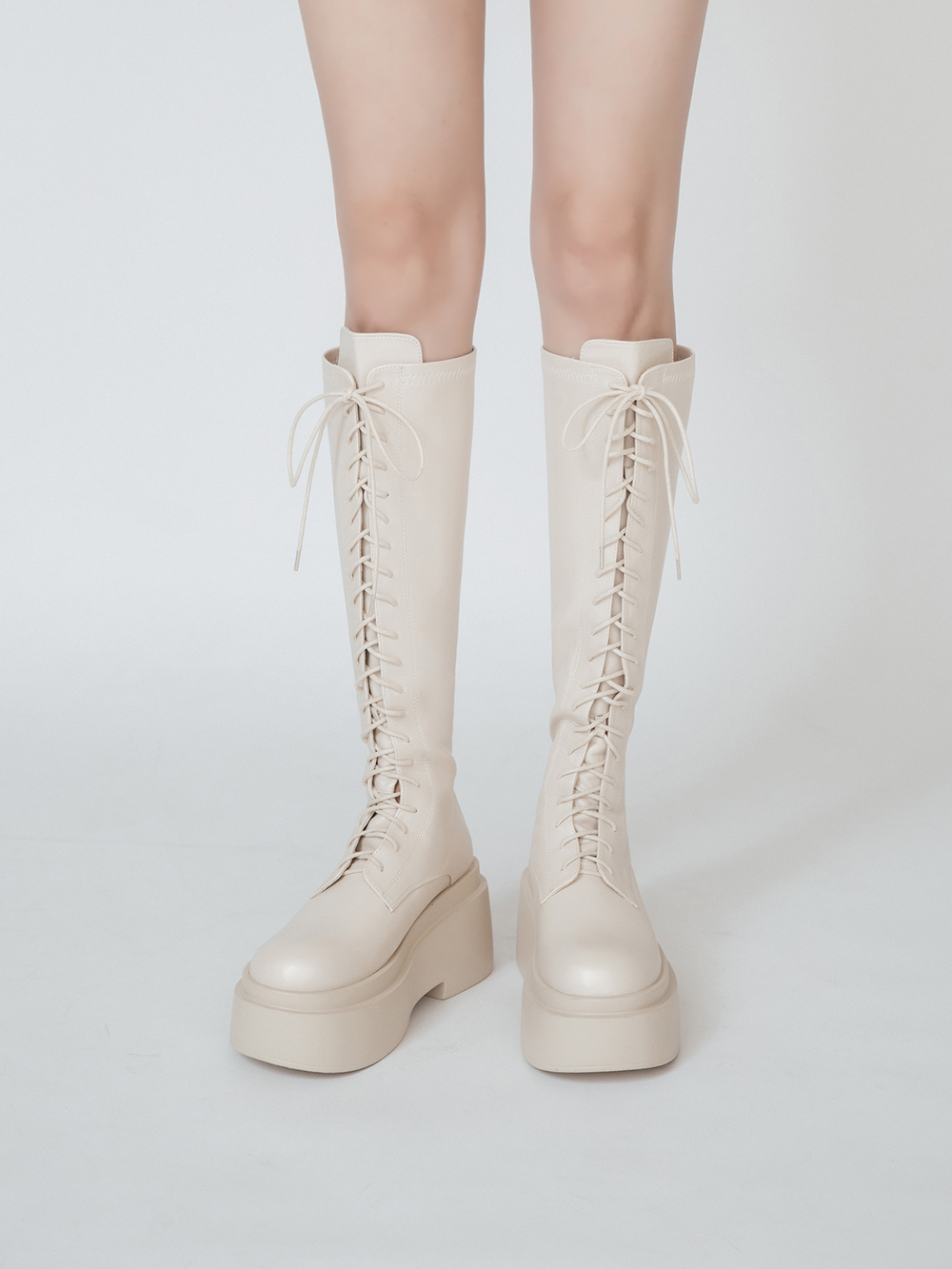 逆天長腿．Plus級加厚鬆糕底綁帶長靴 香草米