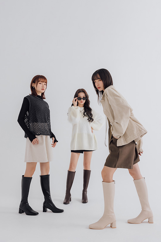 D+AF神級美腿．素面方頭高跟瘦瘦長靴穿搭，搭配裙裝展現顯瘦腿型，適合跨年派對。