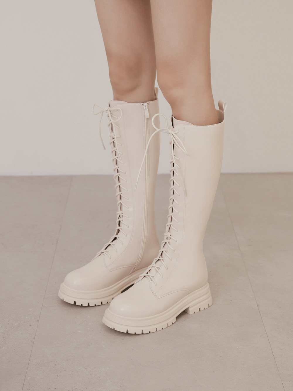 全場焦點鬆糕底綁帶馬汀長靴 米白